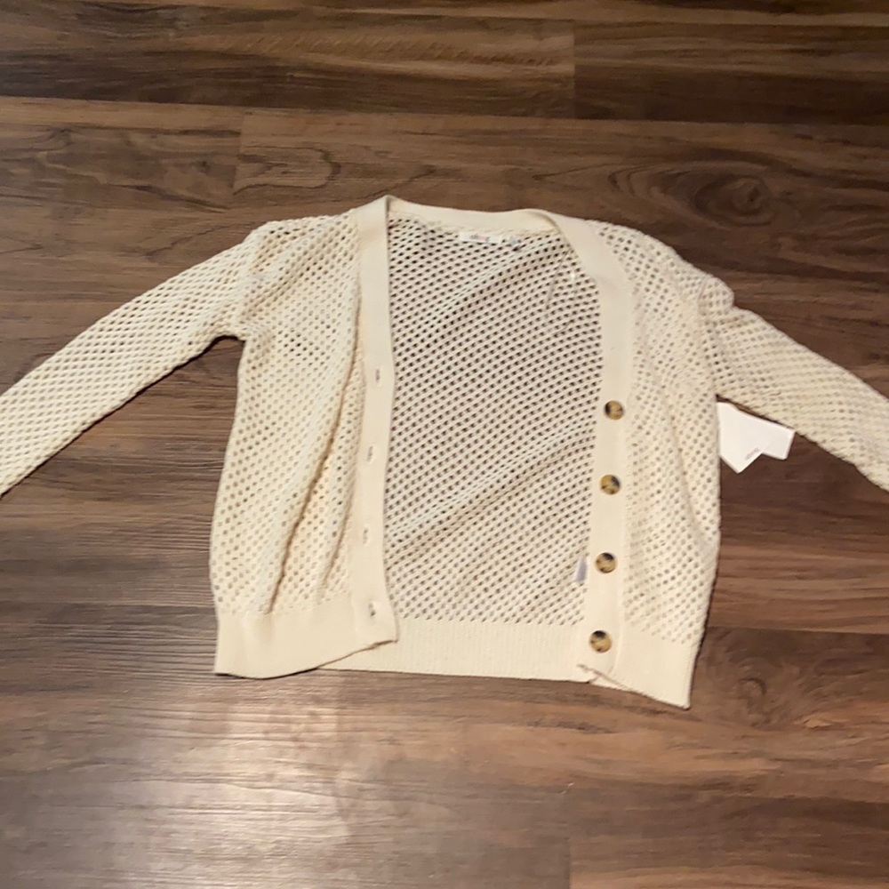 Ohmg warm white sweater with brown buttons